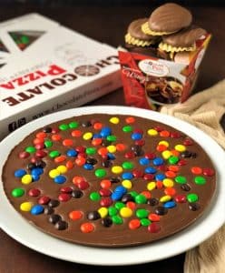 candy topped chocolate pizza and peanut butter wings