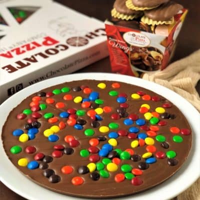 candy topped chocolate pizza and peanut butter wings
