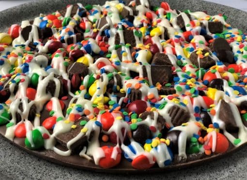 close up candy avalanche chocolate pizza