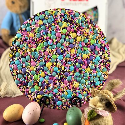 pastel chocolate candies on a celebrate spring chocolate pizza