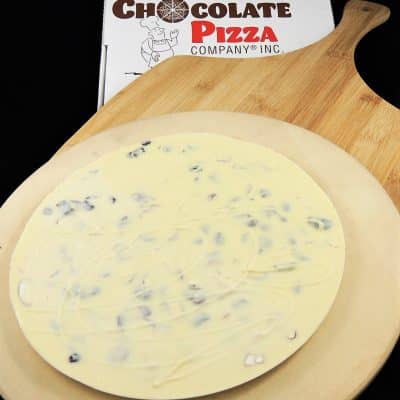 https://www.chocolatepizza.com/wp-content/uploads/2017/04/White-Chocolate-Pizza-with-cranberries-and-almonds-stone-sneel-box-400x400.jpg