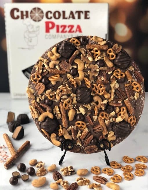 chocolate pizza with pretzels caramel cashews pecans walnuts