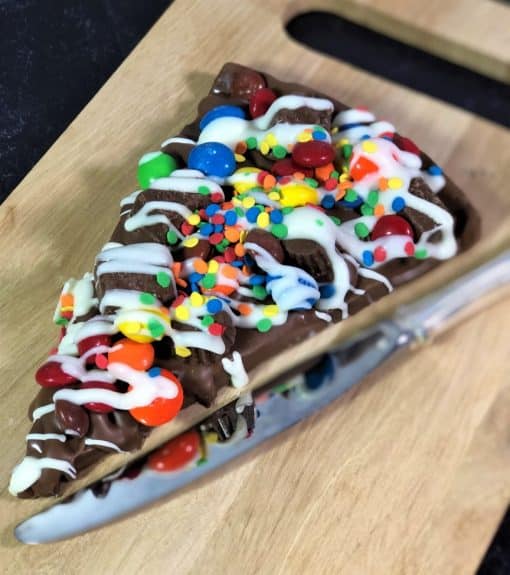 candy avalanche slice on wooden board