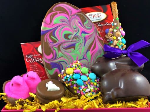 Easter basket with swirled Easter egg and handcrafted chocolate treats