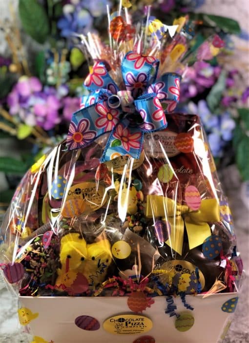 Easter basket with swirled Easter Egg and chocolates