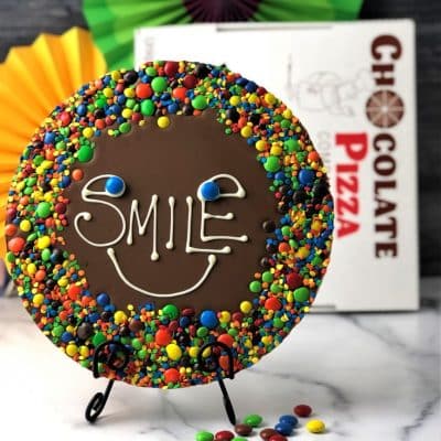 big smile chocolate pizza with colorful candy border