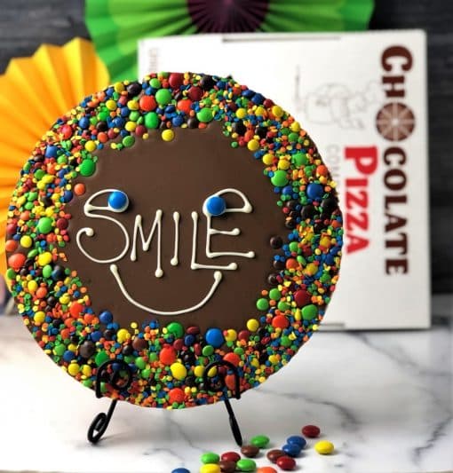 big smile chocolate pizza with colorful candy border