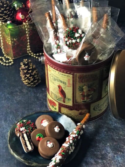 holiday party tin with pretzels and cookies